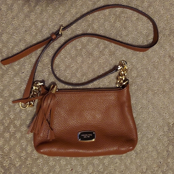 Michael Kors Handbags - Michael Kors pebbled leather brown purse with tassel